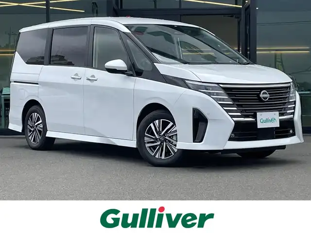 日産 セレナ ハイウェイスター V 東京都 2025(令7)年 0.1千km プリズムホワイト 純正12.3インチナビ/（フルセグTV/Bluetooth/HDMI/AM/FM）/プロパイロット/アラウンドビューモニター/インテリジェントルームミラー/ハンズフリーオートスライドドア/純正ビルトインETC2.0/オートハイビーム/純正ドライブレコーダー/パドルシフト/USBポート/LEDヘッドライト/LEDフォグランプ/インテリジェントエマージェンシーブレーキ/前方衝突予測警報/衝突回避ステアリングアシスト/車線逸脱防止支援システム/車線逸脱警報/後側方衝突防止支援システム/コーナーセンサー/ふらつき警報/踏み間違い衝突防止アシスト/標識検知機能/電動パーキングブレーキ