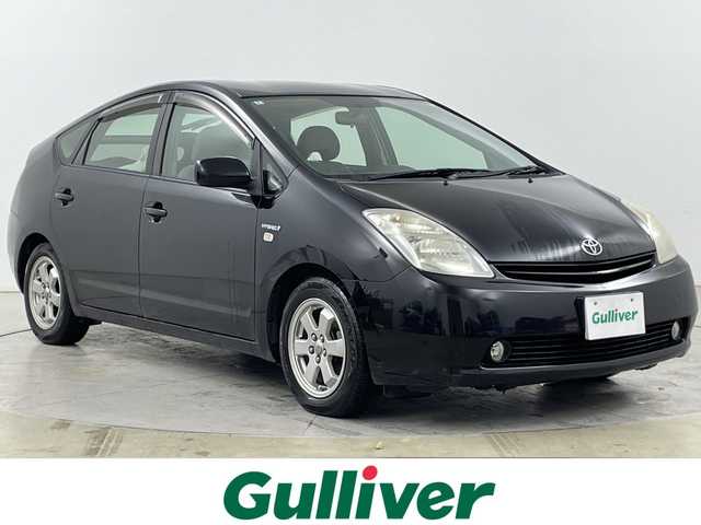 トヨタ プリウス EX 道央・札幌 2010(平22)年 17.4万km ブラック ・純正ナビ（メーカーオプションナビ）　/・CD/HDD/BT/・バックカメラ　/・オートライト　/・ステアリングスイッチ　/・オートライト　/・横滑り防止装置　/・プッシュスタート　/・スマートキー　/・電動格納ミラー　/・純正フロアマット　/？盗難防止装置　/・積込スタッドレス社外AW