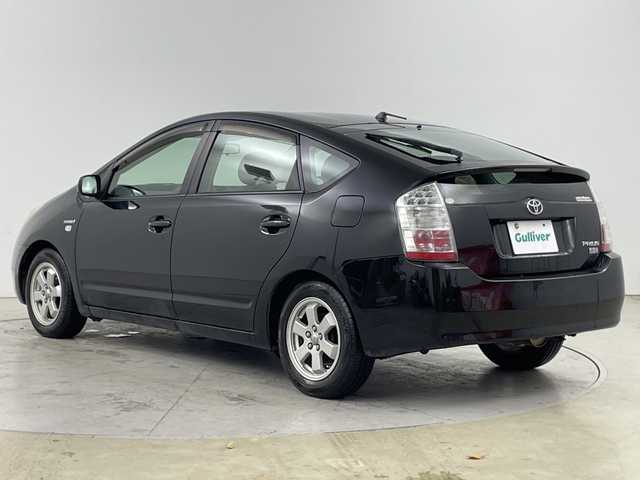 トヨタ プリウス EX 道央・札幌 2010(平22)年 17.4万km ブラック ・純正ナビ（メーカーオプションナビ）　/・CD/HDD/BT/・バックカメラ　/・オートライト　/・ステアリングスイッチ　/・オートライト　/・横滑り防止装置　/・プッシュスタート　/・スマートキー　/・電動格納ミラー　/・純正フロアマット　/？盗難防止装置　/・積込スタッドレス社外AW