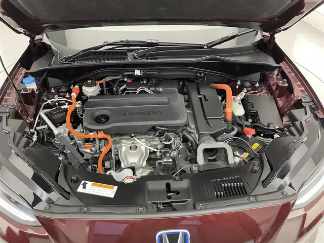 ホンダ ＺＲ－Ｖ ハイブリッド e:HEV Z 滋賀県 2023(令5)年 1.4万km アーバンチタニウムメタリック 純正9インチナビ/【Bluetooth/USB/フルセグTV】/BOSEプレミアムサウンド/ホンダセンシング/・衝突軽減ブレーキ（CMBS）/・先行車発進お知らせ機能/・歩行者事故低減ステアリング/・路外逸脱抑制機能/・標識認識機能/・渋滞追従機能付アダプティブクルーズコントロール/・車線維持支援システム（LKAS）/・トラフィックジャムアシスト（渋滞運転支援機能）/・ブラインドスポットインフォメーション/・誤発進抑制機能/・後方誤発進抑制機能/・近距離衝突軽減ブレーキ/・パーキングセンサーシステム/・後退出庫サポート/・オートハイビーム/・アダプティブドライビングビーム/全方位カメラ/クリアランスソナー/レザーシート/D/Nパワーシート/D/Nシートヒーター/LEDヘッドライト/パワーバックドア/ヒルディセントコントロール/電動パーキングブレーキ/オートブレーキホールド/ビルトインETC2.0