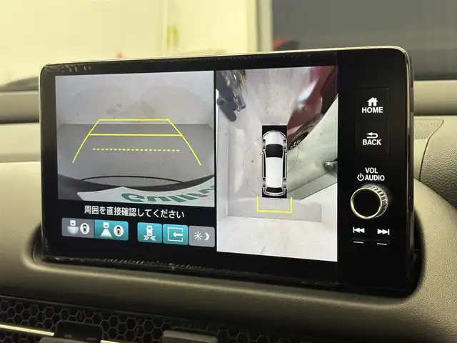 ホンダ ＺＲ－Ｖ ハイブリッド e:HEV Z 滋賀県 2023(令5)年 1.4万km アーバンチタニウムメタリック 純正9インチナビ/【Bluetooth/USB/フルセグTV】/BOSEプレミアムサウンド/ホンダセンシング/・衝突軽減ブレーキ（CMBS）/・先行車発進お知らせ機能/・歩行者事故低減ステアリング/・路外逸脱抑制機能/・標識認識機能/・渋滞追従機能付アダプティブクルーズコントロール/・車線維持支援システム（LKAS）/・トラフィックジャムアシスト（渋滞運転支援機能）/・ブラインドスポットインフォメーション/・誤発進抑制機能/・後方誤発進抑制機能/・近距離衝突軽減ブレーキ/・パーキングセンサーシステム/・後退出庫サポート/・オートハイビーム/・アダプティブドライビングビーム/全方位カメラ/クリアランスソナー/レザーシート/D/Nパワーシート/D/Nシートヒーター/LEDヘッドライト/パワーバックドア/ヒルディセントコントロール/電動パーキングブレーキ/オートブレーキホールド/ビルトインETC2.0