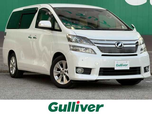 トヨタ ヴェルファイア 2．4V 千葉県 2013(平25)年 4.9万km ホワイトパールクリスタルシャイン 純正7インチHDDナビ（BT/Blu-ray/DVD/CD)/　B-Cas無し/フルセグ（走行中不可）/アルパイン　フリップダウンモニター/コムテック　ドラレコ　（360度・リア）/クルーズコントロール/運転席・助手席　パワーシート/助手席　オットマン/運転席　シートメモリ/ETC/両側パワースラド/HIDライト/スペアキー