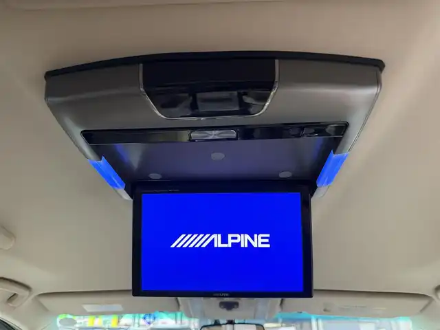 トヨタ ヴェルファイア 2．4V 千葉県 2013(平25)年 4.9万km ホワイトパールクリスタルシャイン 純正7インチHDDナビ（BT/Blu-ray/DVD/CD)/　B-Cas無し/フルセグ（走行中不可）/アルパイン　フリップダウンモニター/コムテック　ドラレコ　（360度・リア）/クルーズコントロール/運転席・助手席　パワーシート/助手席　オットマン/運転席　シートメモリ/ETC/両側パワースラド/HIDライト/スペアキー