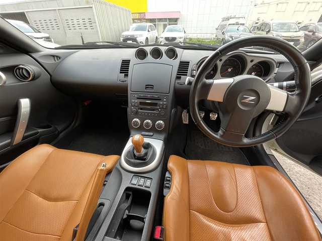 日産 フェアレディ Ｚ バージョンST 道央・札幌 2007(平19)年 8.5万km ホワイトパール ・純正CD/・革シート/・運転席パワーシート/・前席シートヒーター/・ETC/・横滑り防止/・BOSEスピーカー/・キーレス/・HID/・電格ミラー/・社外マフラー