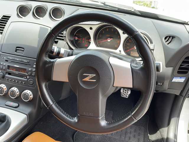 日産 フェアレディ Ｚ バージョンST 道央・札幌 2007(平19)年 8.5万km ホワイトパール ・純正CD/・革シート/・運転席パワーシート/・前席シートヒーター/・ETC/・横滑り防止/・BOSEスピーカー/・キーレス/・HID/・電格ミラー/・社外マフラー