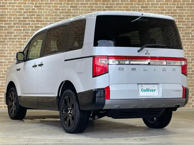三菱 デリカＤ：５ シャモニー 岩手県 2025(令7)年 0.1千km 白Ⅱ 登録済み未使用車/４WD/ディーゼルターボ/マルチアラウンドモニター/エレクトリックテールゲート/両側電動スライドドア/ナビ取り付けパッケージ/e-Assist/衝突被害軽減ブレーキ/レーダークルーズコントロールシステム/オートマチックハイビーム/誤発進抑制機能/後側方車両検知警報システム/後退時交差車両検知警報システム/横滑り防止装置/アイドリングストップ/パドルシフト/オートブレーキホールド/AC100V100Wコンセント/撥水機能付き専用コンビネーションシート/専用18インチアルミホイール/運転席パワーシート/前席シートヒーター/ステアリングヒーター/リヤマニュアルクーラー/PTCヒーター/ヒーテッドドアミラー/LEDヘッドライト