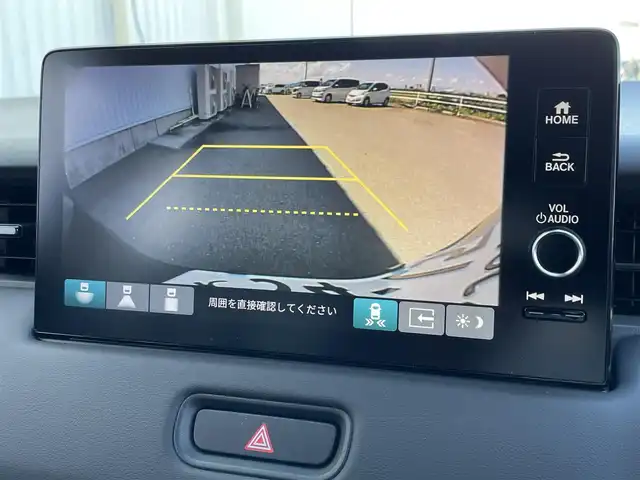 ホンダ ヴェゼル ハイブリッド e:HEV Z 佐賀県 2025(令7)年 0.1千km クリスタルブラックパール 登録済未使用車/DN登録時走行距離５ｋｍ/純正9型ナビゲーション/・AM/FM/BT//・Appple Car Play/Android Auto//・バックカメラ/ブラインドスポットモニター/パワーバックドア/純正18インチアルミホイール/ハーフレザーシート/シートヒーター「運転席/助手席」/アダプティブLEDヘッドライト/スマートキー/・スペアキー1本/ビルトインETC2.0/ホンダセンシング/・衝突軽減ブレーキ/・踏み間違え衝突軽減システム/・歩行者事故低減ステアリング /・車線維持支援システム/・アダプティブ・クルーズ・コントロール/・渋滞運転支援機能/・先行車発進お知らせ機能 /・標識認識機能/・ヒルスタートアシスト