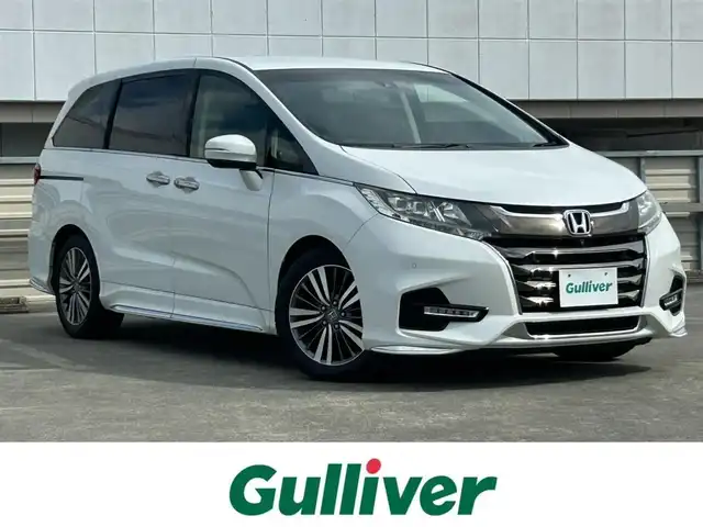 ホンダ オデッセイ アブソルート・EXホンダセンジング 静岡県 2019(平31)年 8万km プラチナホワイトパール 純正9インチナビ/フルセグTV/ETC2.0/全周囲モニター/フリップダウンモニター/ハーフレザーシート/パワーシート/シートヒーターD＋N/LEDヘッドライト/ホンダセンシング/デュアルエアコン/本革巻きステアリング/純正17AW