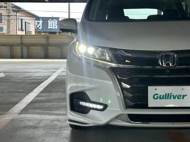 ホンダ オデッセイ アブソルート・EXホンダセンジング 静岡県 2019(平31)年 8万km プラチナホワイトパール 純正9インチナビ/フルセグTV/ETC2.0/全周囲モニター/フリップダウンモニター/ハーフレザーシート/パワーシート/シートヒーターD＋N/LEDヘッドライト/ホンダセンシング/デュアルエアコン/本革巻きステアリング/純正17AW