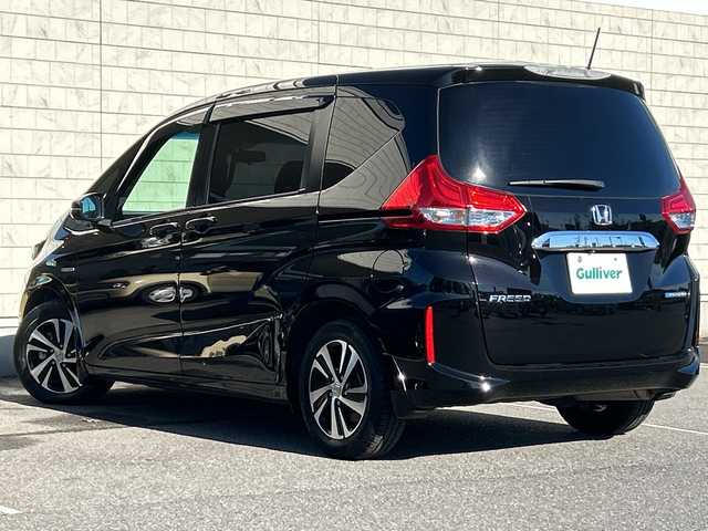 ホンダ フリード ハイブリット G ホンダセンシング 茨城県 2019(平31)年 6.7万km プレミアムスパークルブラックパール ALPINEナビ/後席フリップダウンモニター/(地デジTV・CD・DVD・BT・ラジオ再生)/両側パワースライドドア/レーダークルーズコントロール/レーンアシスト/衝突軽減ブレーキ/コーナーセンサー/ハーフレザーシート/バックカメラ/ETC/純正15inアルミホイール/純正フロアマット/スマートキー/取扱説明書/保証書