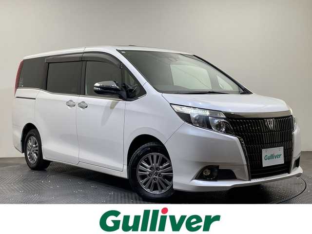 トヨタ エスクァイア Gi ブラックテーラード 愛媛県 2016(平28)年 7.7万km ホワイトパールクリスタルシャイン ツインムーンルーフ/リアオートエアコン//ＡＬＰＩＮＥ１１インチナビ/フルセグTV　Bluetooth DVD再生/両側電動スライドドア/ビルトインＥＴＣ/シートヒーター/クルーズコントロール/革巻きステアリング/ＬＥＤヘッドライト/オートマチックハイビーム