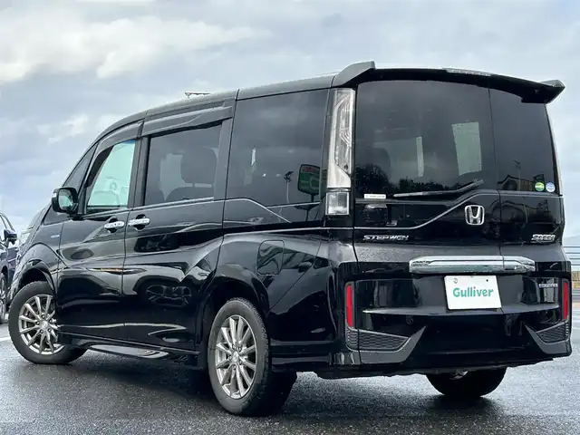 ホンダ ステップワゴン スパーダ ハイブリッド G EX ホンダセンシング 島根県 2017(平29)年 15.7万km 黒 登録時走行距離157745km/純正9インチナビ（BT/TV/CD/DVD/FM/AM）/クルーズコントロール/ドライブレコーダー（前のみ）/両側パワースライドドア/前席シートヒーター/コーナーセンサー（前後）/純正アルミホイール/純正フロアマット/LEDヘッドライト/プッシュスタート/衝突軽減装置/横滑り防止装置