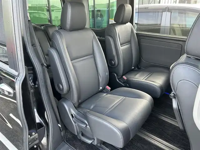 ホンダ ステップワゴン スパーダ ハイブリッド G EX ホンダセンシング 島根県 2017(平29)年 15.7万km 黒 登録時走行距離157745km/純正9インチナビ（BT/TV/CD/DVD/FM/AM）/クルーズコントロール/ドライブレコーダー（前のみ）/両側パワースライドドア/前席シートヒーター/コーナーセンサー（前後）/純正アルミホイール/純正フロアマット/LEDヘッドライト/プッシュスタート/衝突軽減装置/横滑り防止装置