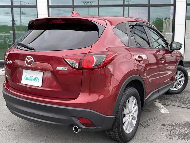 マツダ ＣＸ－５ XD 道東・釧路十勝 2014(平26)年 8.2万km ジールレッドマイカ ・４WD/・社外メモリーナビゲーション(CN-RE07D)/(CD/DVD/フルセグ/BT/SD/iPod)/・バックカメラ/・純正エンジンスターター/・社外ドライブレコーダー前後/・ETC/・クルーズコントロール/・リアビークルモニタリングシステム/・横滑り防止装置/・衝突軽減ブレーキ/・純正フロアマット/・社外AW１７インチ＋冬タイヤ/・純正AW夏タイヤ積込/・オートライト/・スマートキー/・プッシュスタート/・HIDヘッドライト/・フォグランプ/・ドアバイザー/・防眩ミラー/・保証書付き/・取説付き