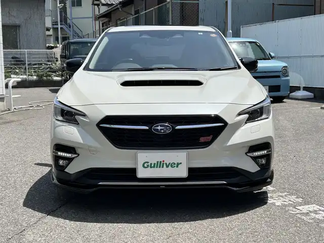 スバル レヴォーグ 1．8STIスポーツ EX 愛知県 2023(令5)年 2.7万km クリスタルホワイトP ワンオーナー/純メーカー11.6インチナビテレビ/フルセグテレビ/サンルーフ/黒赤コンビレザーシート/デジタルインナーミラー/STiアンダースポイラー/ドライブレコーダー/バックサイドカメラ/パワーバックドア/純18インチAW/レーダークルースコントロール/新車保証書.取説/スペアキー