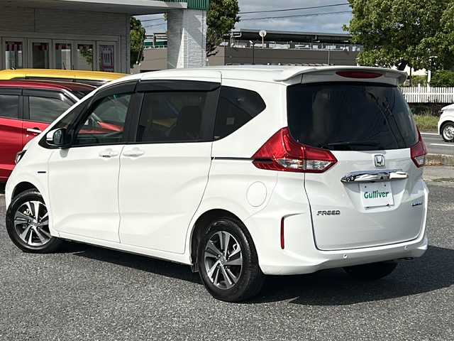 ホンダ フリード ハイブリット G 千葉県 2022(令4)年 5万km プラチナホワイトパール レーダークルーズ　レーンアシスト　ホンダセンシング　シートヒーター　両側パワースライドドア　ドラレコ　純正１５インチＡＷ　オートライト　ＬＥＤライト　バックセンサー　リアスポイラー　スマートキー