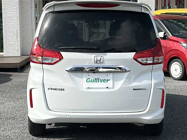 ホンダ フリード ハイブリット G 千葉県 2022(令4)年 5万km プラチナホワイトパール レーダークルーズ　レーンアシスト　ホンダセンシング　シートヒーター　両側パワースライドドア　ドラレコ　純正１５インチＡＷ　オートライト　ＬＥＤライト　バックセンサー　リアスポイラー　スマートキー