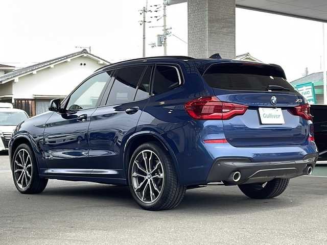 ＢＭＷ Ｘ３ xDrive20d Mスポーツ 愛媛県 2017(平29)年 6.1万km ファイトニックブルー ワンオーナー/純正メーカーナビ/・Bluetooth/・フルセグ/・CD/DVD/・全方位カメラ/・バックカメラ/ガラスルーフ/harman/Kardon/パワーバックドア/レーダークルーズコントロール/パワーシートD/N席/シートヒーターD/N席/オートホールド/コーナーセンサー/レーンアシスト/ルーフレール/パーキングアシスト/電動パーキング/置型充電器/プッシュスタート/MTモード/USB端子