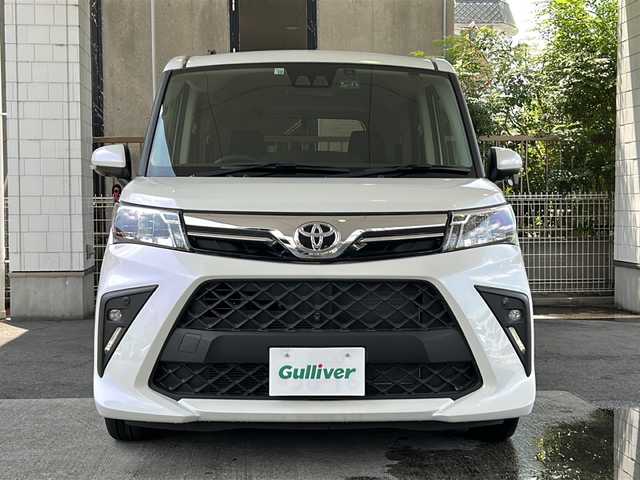 トヨタ ルーミー G 京都府 2022(令4)年 0.2万km パールホワイトⅢ ワンオーナー車/純正SDナビ/・Bluetooth Audio/・CD/・ワンセグTV/・USB/バックカメラ/パノラミックビューモニター/アイドリングストップ/前後ドライブレコーダー/スマートアシスト/・衝突警報機能/・衝突回避支援ブレーキ機能/・ブレーキ制御付誤発進抑制機能/・車線逸脱警報機能/・路側逸脱警報機能/・ふらつき警報/・先行車発進お知らせ機能/・クリアランスソナー/・AHB/・ADB/シートヒーター(D＋N席)/両側パワースライドドア/ステアリングスイッチ/電動格納ウィンカーミラー/リアサンシェード/オートリトラクタブルミラー/純正フロアマット/純正ドアバイザー/取扱説明書/ナビ取扱説明書/保証書/スマートキースペア