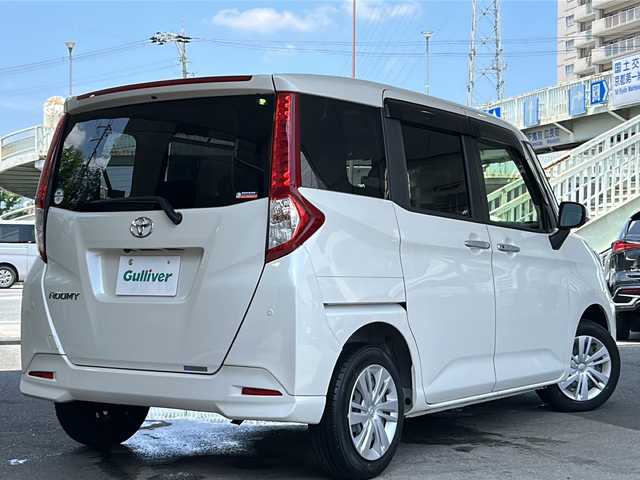 トヨタ ルーミー G 京都府 2022(令4)年 0.2万km パールホワイトⅢ ワンオーナー車/純正SDナビ/・Bluetooth Audio/・CD/・ワンセグTV/・USB/バックカメラ/パノラミックビューモニター/アイドリングストップ/前後ドライブレコーダー/スマートアシスト/・衝突警報機能/・衝突回避支援ブレーキ機能/・ブレーキ制御付誤発進抑制機能/・車線逸脱警報機能/・路側逸脱警報機能/・ふらつき警報/・先行車発進お知らせ機能/・クリアランスソナー/・AHB/・ADB/シートヒーター(D＋N席)/両側パワースライドドア/ステアリングスイッチ/電動格納ウィンカーミラー/リアサンシェード/オートリトラクタブルミラー/純正フロアマット/純正ドアバイザー/取扱説明書/ナビ取扱説明書/保証書/スマートキースペア