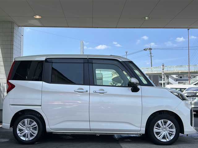 トヨタ ルーミー G 京都府 2022(令4)年 0.2万km パールホワイトⅢ ワンオーナー車/純正SDナビ/・Bluetooth Audio/・CD/・ワンセグTV/・USB/バックカメラ/パノラミックビューモニター/アイドリングストップ/前後ドライブレコーダー/スマートアシスト/・衝突警報機能/・衝突回避支援ブレーキ機能/・ブレーキ制御付誤発進抑制機能/・車線逸脱警報機能/・路側逸脱警報機能/・ふらつき警報/・先行車発進お知らせ機能/・クリアランスソナー/・AHB/・ADB/シートヒーター(D＋N席)/両側パワースライドドア/ステアリングスイッチ/電動格納ウィンカーミラー/リアサンシェード/オートリトラクタブルミラー/純正フロアマット/純正ドアバイザー/取扱説明書/ナビ取扱説明書/保証書/スマートキースペア