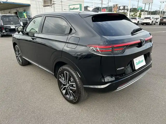 ホンダ ヴェゼル ハイブリッド e:HEV Z 岡山県 2025(令7)年 0.1千km クリスタルブラックパール 登録時走行距離3km/純正9インチナビ/フルセグTV(AM.FM.TV.BT)/バックカメラ/ETC2.0/ブラインドスポットモニター/シートヒーター/ステアリングヒーター/クリアランスソナー/衝突軽減ブレーキ/レーダークルーズコントロール/レーンキープアシスト/オートライト/アイドリングストップ/電動リアゲート/18インチ純正AW
