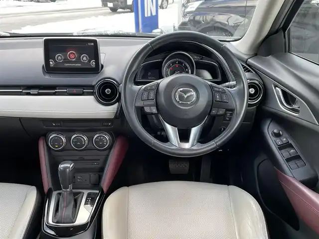 マツダ ＣＸ－３ XD ツーリング Lパッケージ 道央・札幌 2015(平27)年 9.1万km セラミックM (株)IDOMが運営する【じしゃロン札幌豊平店】の自社ローン対象車両になります。こちらは現金ご利用時の価格です。/自社ローンご希望の方は別途その旨お申付け下さい。/4WD/純正ナビ・フルセグTV/　　(CD/DVD/BT)/バックカメラ/レーダークルーズコントロール/LEDオートライト/ハーフレザーシート/シートヒーター/純正16インチアルミホイール/ステアリングスイッチ/パドルシフト/ヘッドアップディスプレイ/スマートキー/ETC