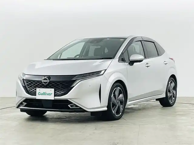 日産 オーラ G 福島県 2023(令5)年 2万km ブリリアントシルバー ワンオーナー/純正ナビ/（AM/FM/BT/HDMI)/プロパイロット/・アダプティブクルーズコントロール/・車線逸脱警報/・レーンアシスト/・ブラインドスポットモニター/・クリアランスソナー/フルセグTV/ETC2.0/アラウンドビューモニター/デジタルインナーミラー/ドライブレコーダー/ブラインドスポットモニター/LEDヘッドライト/・フォグランプ/ウィンカードアミラー/BOSEサウンド/純正17インチAW/ハーフレザーシート/スマートキー/・スペアキー/ドアバイザー/純正フロアマット/取説/・保証書
