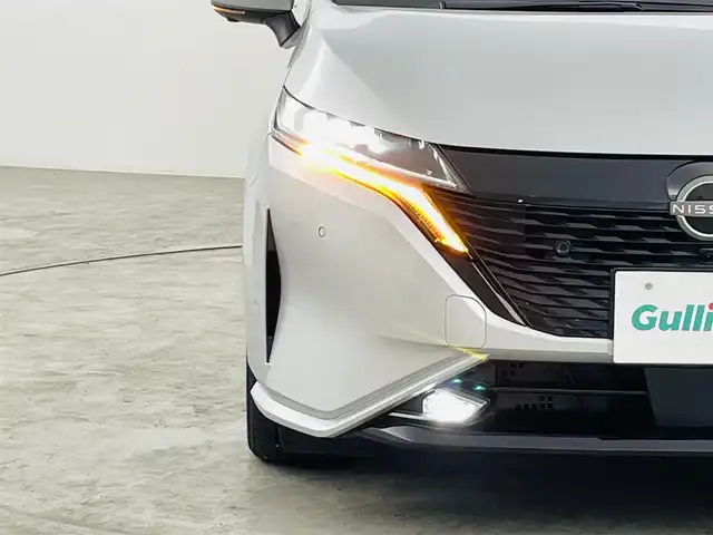 日産 オーラ G 福島県 2023(令5)年 2万km ブリリアントシルバー ワンオーナー/純正ナビ/（AM/FM/BT/HDMI)/プロパイロット/・アダプティブクルーズコントロール/・車線逸脱警報/・レーンアシスト/・ブラインドスポットモニター/・クリアランスソナー/フルセグTV/ETC2.0/アラウンドビューモニター/デジタルインナーミラー/ドライブレコーダー/ブラインドスポットモニター/LEDヘッドライト/・フォグランプ/ウィンカードアミラー/BOSEサウンド/純正17インチAW/ハーフレザーシート/スマートキー/・スペアキー/ドアバイザー/純正フロアマット/取説/・保証書