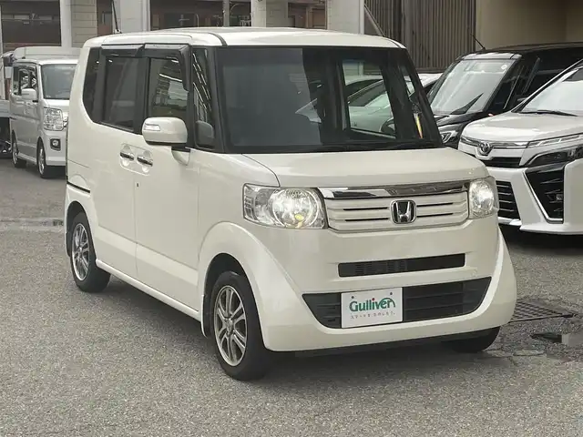 ホンダ Ｎ ＢＯＸ G SSパッケージ 大阪府 2013(平25)年 6万km プレミアムホワイトパール 純正ナビ/地デジTV/CD/DVD/SD/バックカメラ/両側パワスラ/OPキセノンライト/ブラックインテリア/クロームメッキドアハンドル/D席ハイトアジャスター/アイドリングストップ/オートライト /保証書
