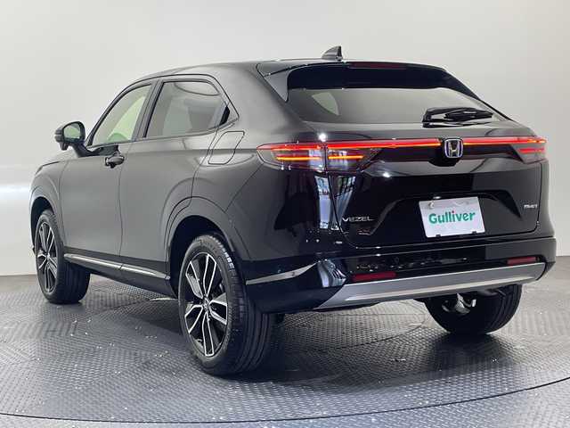 ホンダ ヴェゼル ハイブリッド e:HEV Z 愛媛県 2025(令7)年 0.1千km クリスタルブラックパール Honda CONNECTディスプレー/ETC2.0車載器/ワイヤレス充電器/衝突軽減ブレーキ/レーンキープアシスト/レーダークルーズコントロール/ＤＮ席シートヒーター/ステアリングヒーター/オートマチックハイビーム/パワーバックドア/ヒルディセントコントロール/本革巻きステアリング