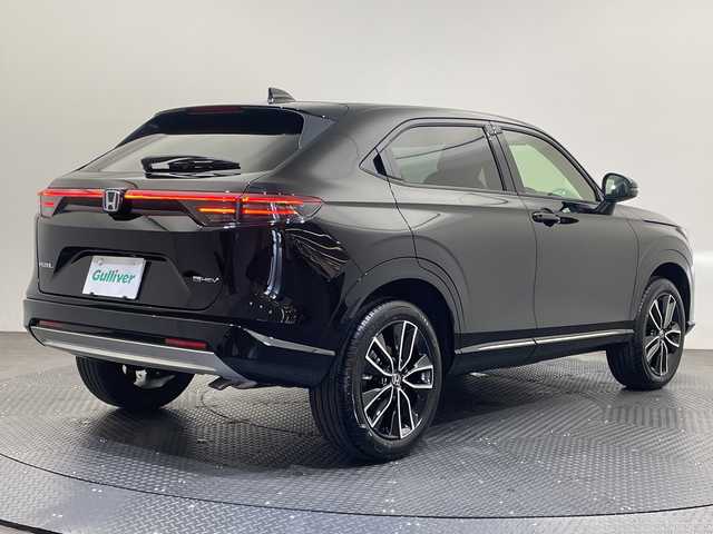 ホンダ ヴェゼル ハイブリッド e:HEV Z 愛媛県 2025(令7)年 0.1千km クリスタルブラックパール Honda CONNECTディスプレー/ETC2.0車載器/ワイヤレス充電器/衝突軽減ブレーキ/レーンキープアシスト/レーダークルーズコントロール/ＤＮ席シートヒーター/ステアリングヒーター/オートマチックハイビーム/パワーバックドア/ヒルディセントコントロール/本革巻きステアリング