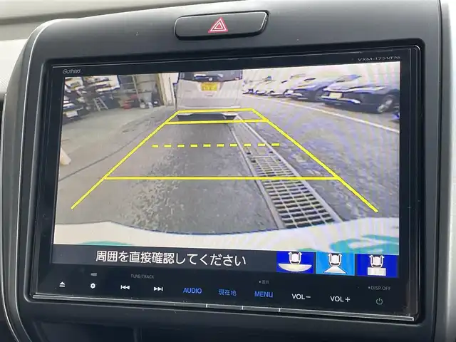 ホンダ フリード ハイブリット EX 東京都 2017(平29)年 6.6万km プレミアムディープロッソパール 純正９型ナビ　/純正１１型後席モニター　/両側電動　/前後ドラレコ　/ビルトインＥＴＣ　/前席シートヒーター　/追従クルコン　/フルセグＴＶ　/Ｂｌｕｅｔｏｏｔｈ　/純正１５インチＡＷ　/寒冷地仕様　/衝突被害軽減