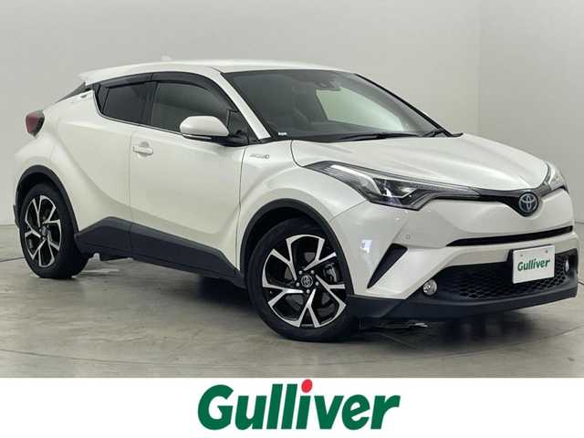 トヨタ Ｃ－ＨＲ G 福岡県 2018(平30)年 5.1万km ホワイトパールクリスタルシャイン 純正９型ナビ（ＢＴ，フルセグＴＶ）　/バックカメラ　/ビルトインＥＴＣ　/前後ドラレコ　/レーダークルコン　/コーナーセンサー　/衝突軽減ブレーキ　/レーンキープ　/ＢＳＭ　/ハーフレザー　/シートヒーター　/ＬＥＤライト