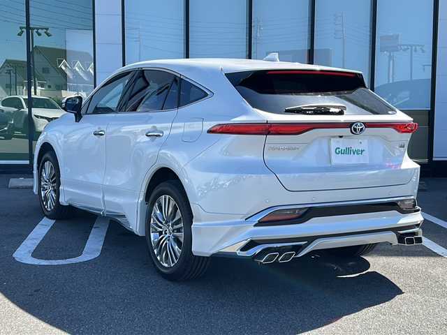 トヨタ ハリアー ハイブリッド Z レザーパッケージ 岐阜県 2025(令7)年 0.1万km プラチナホワイトパールマイカ 登録時走行距離：338km/純正ナビ/全方位カメラ/Bluetooth・フルセグテレビ・USB・HDMI/モデリスタエアロ/JBLプレミアムサウンド/レザーシート/シートヒーター/エアシート/前席パワーシート/ポジショニングメモリー/レーダークルーズコントロール/ステアリングヒーター/レザーステアリング/ステアリングスイッチ/ブラインドスポットモニター/デジタルインナーミラー/ドライブレコーダー/前後コーナーセンサー/レーンキープアシスト/オートホールド/電動パーキング/パワーバックドア/LEDヘッドライト/オートライト/オートマチックハイビーム/フォグライト/オートワイパー/プッシュスタート/スマートキー/取扱説明書
