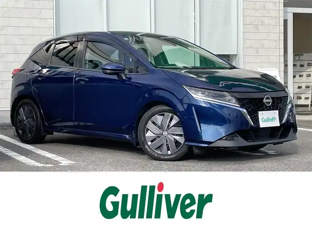 日産 ノート X 宮崎県 2021(令3)年 9万km オーロラフレアブルーパール 純正フルセグナビ/（BT）（ Apple Car Play）/アイドリングストップ/プッシュスタート/全周囲カメラ/ドライブレコーダー/パーキングアシスト/パワーステアリング/パワーウィンドウ/クルーズコントロール/純正フロアマット/純正LEDヘッドライト/純正アルミホイール/コナーセンサー/オートライト/エアバックW+サイド/横滑り防止装置/盗難防止装置/衝突被害軽減システム/AAC/ABS/ETC/４WD