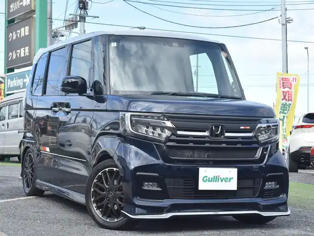 ホンダ Ｎ ＢＯＸ カスタム L ターボ 神奈川県 2022(令4)年 4.2万km ミッドナイトブルービームM テイン車高調/シルクブレイズフロントリップ/バタフライシステムリアフラップスポイラー/無限リアスポイラー/無限ブレーキディスク、パッド/無限スポーツペダル/無限ハイドロフィリックLEDミラー/ロッソモデロテールフィニッシャー（ダミーマフラー）/パイオニアパワードサブウーファー/ドラレコ前後/純正メモリナビ/Bluetooth/地デジTV/Bカメラ/CD/DVD/ETC/LEDヘッドライト/純正フロアマット/専用ドアポケットLEDイルミネーション/アルミパドルシフト（レッド）/ワンオーナー/取説ナビ説、他カスタム説明書/スペアスマートキー