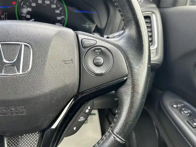 ホンダ ヴェゼル ハイブリッド X 岡山県 2014(平26)年 9.8万km ホワイトオーキッドパール SDナビゲーション/（CD　DVD　Bluetooth　フルセグTV）/前後ドライブレコーダー/スマートキー×2/ETC/電子パーキング/革巻きステアリング/ステアリングリモコン/パドルシフト/純正フロアマット/純正16インチアルミホイール/フォグライト