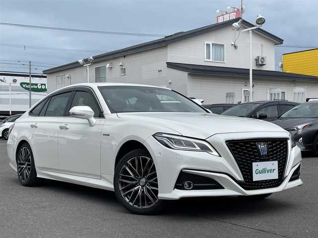 トヨタ クラウン ハイブリッド G－エグゼクティブ Four 道央・札幌 2019(平31)年 10.2万km ホワイトパールクリスタルシャイン 登録時走行距離101324ｋｍ/　４　Ｗ　Ｄ　/寒冷地仕様/純正ナビ（CD/DVD/FM/AM/BT/USB）/フルセグTV(走行中視聴不可)/バックカメラ/全周囲カメラ/ウィンカーミラー/クルーズコントロール（追従走行あり）/ドアバイザー/プッシュスタート/ビルトインETC2.0/スペアキー×１/ドライブレコーダー/パワーシート（運転席/助手席）/シートヒーター(運転席/助手席)/エアシート（運転席/助手席）/純正フロアマット/横滑り防止装置/コーナーセンサー/レーンキープアシスト/盗難防止装置/オートライト/オートマチックハイビーム/衝突軽減ブレーキ/純正エンジンスターター/ブラインドスポットモニター/フォグランプ/ステアリングスイッチ/パドルシフト/MTモード付AT/ミラーヒーター/革巻きステアリング/EV MODE/DRIVE MODE（SNOW/ECO/NORMAL/SPORT)/nanoe搭載エアコン/シートメモリー/ヘッドアップディスプレイ/積込冬タイヤ/（社外AW/225/45/R18/21年製/溝6ｍｍ）