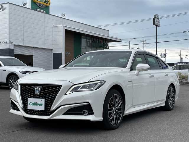 トヨタ クラウン ハイブリッド G－エグゼクティブ Four 道央・札幌 2019(平31)年 10.2万km ホワイトパールクリスタルシャイン 登録時走行距離101324ｋｍ/　４　Ｗ　Ｄ　/寒冷地仕様/純正ナビ（CD/DVD/FM/AM/BT/USB）/フルセグTV(走行中視聴不可)/バックカメラ/全周囲カメラ/ウィンカーミラー/クルーズコントロール（追従走行あり）/ドアバイザー/プッシュスタート/ビルトインETC2.0/スペアキー×１/ドライブレコーダー/パワーシート（運転席/助手席）/シートヒーター(運転席/助手席)/エアシート（運転席/助手席）/純正フロアマット/横滑り防止装置/コーナーセンサー/レーンキープアシスト/盗難防止装置/オートライト/オートマチックハイビーム/衝突軽減ブレーキ/純正エンジンスターター/ブラインドスポットモニター/フォグランプ/ステアリングスイッチ/パドルシフト/MTモード付AT/ミラーヒーター/革巻きステアリング/EV MODE/DRIVE MODE（SNOW/ECO/NORMAL/SPORT)/nanoe搭載エアコン/シートメモリー/ヘッドアップディスプレイ/積込冬タイヤ/（社外AW/225/45/R18/21年製/溝6ｍｍ）