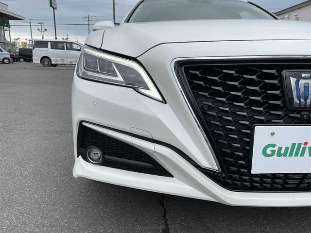 トヨタ クラウン ハイブリッド G－エグゼクティブ Four 道央・札幌 2019(平31)年 10.2万km ホワイトパールクリスタルシャイン 登録時走行距離101324ｋｍ/　４　Ｗ　Ｄ　/寒冷地仕様/純正ナビ（CD/DVD/FM/AM/BT/USB）/フルセグTV(走行中視聴不可)/バックカメラ/全周囲カメラ/ウィンカーミラー/クルーズコントロール（追従走行あり）/ドアバイザー/プッシュスタート/ビルトインETC2.0/スペアキー×１/ドライブレコーダー/パワーシート（運転席/助手席）/シートヒーター(運転席/助手席)/エアシート（運転席/助手席）/純正フロアマット/横滑り防止装置/コーナーセンサー/レーンキープアシスト/盗難防止装置/オートライト/オートマチックハイビーム/衝突軽減ブレーキ/純正エンジンスターター/ブラインドスポットモニター/フォグランプ/ステアリングスイッチ/パドルシフト/MTモード付AT/ミラーヒーター/革巻きステアリング/EV MODE/DRIVE MODE（SNOW/ECO/NORMAL/SPORT)/nanoe搭載エアコン/シートメモリー/ヘッドアップディスプレイ/積込冬タイヤ/（社外AW/225/45/R18/21年製/溝6ｍｍ）