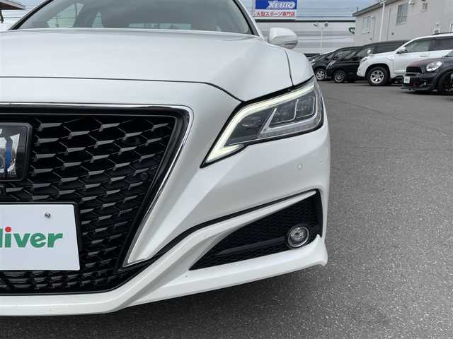 トヨタ クラウン ハイブリッド G－エグゼクティブ Four 道央・札幌 2019(平31)年 10.2万km ホワイトパールクリスタルシャイン 登録時走行距離101324ｋｍ/　４　Ｗ　Ｄ　/寒冷地仕様/純正ナビ（CD/DVD/FM/AM/BT/USB）/フルセグTV(走行中視聴不可)/バックカメラ/全周囲カメラ/ウィンカーミラー/クルーズコントロール（追従走行あり）/ドアバイザー/プッシュスタート/ビルトインETC2.0/スペアキー×１/ドライブレコーダー/パワーシート（運転席/助手席）/シートヒーター(運転席/助手席)/エアシート（運転席/助手席）/純正フロアマット/横滑り防止装置/コーナーセンサー/レーンキープアシスト/盗難防止装置/オートライト/オートマチックハイビーム/衝突軽減ブレーキ/純正エンジンスターター/ブラインドスポットモニター/フォグランプ/ステアリングスイッチ/パドルシフト/MTモード付AT/ミラーヒーター/革巻きステアリング/EV MODE/DRIVE MODE（SNOW/ECO/NORMAL/SPORT)/nanoe搭載エアコン/シートメモリー/ヘッドアップディスプレイ/積込冬タイヤ/（社外AW/225/45/R18/21年製/溝6ｍｍ）