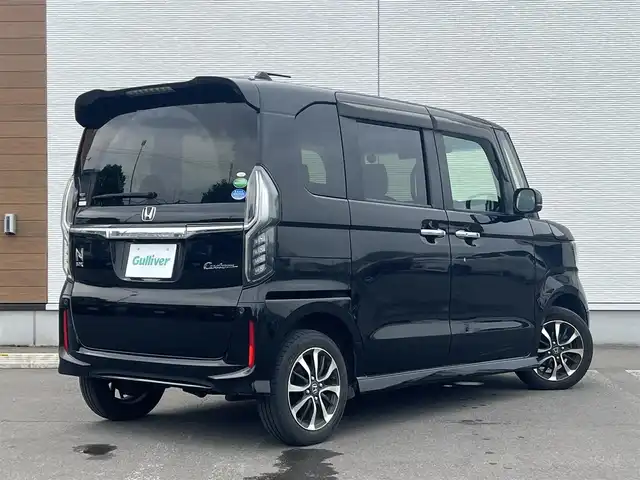 ホンダ Ｎ ＢＯＸ カスタム G EX ホンダセンシング 秋田県 2018(平30)年 7.5万km クリスタルブラックパール ４WD/衝突軽減システム/LEDヘッドライト/片側パワスラ/純正ナビ/フルセグ/バックカメラ/純正アルミ/スマートキー/アイドリングストップ/コーナーセンサー/プッシュスタート/レーンキープアシスト/クルーズコントロール/ステアリングスイッチ/前席シートヒーター/ETC/純正リアスポイラー/純正フロアマット/純正ドアバイザー/オートライト/オートエアコン/パワーステアリング/パワーウィンドウ/横滑り防止/電動格納ウィンカーミラー/取扱説明書