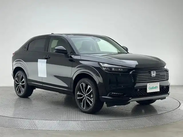 ホンダ ヴェゼル ハイブリッド e:HEV Z 兵庫県 2025(令7)年 0.1千km クリスタルブラックパール e:HEV Z　3VC4AZ/HondaCONNECTディスプレー+ETC2.0車載器+ワイヤレス充電器(220000)/登録済未使用車/純正DA/純正メモリナビ/（BT、フルセグ）/APPLECarPlay/AndroidAut/USB/ワイヤレス充電/バックカメラ/コーナーセンサー/パドルシフト/ステアリングヒーター/パワーバックドア/シートヒーター/ハーフレザー/ビルトインETC２．０/BSM/LKA/PCS/オートハイビーム/LEDヘッドライト/LEDフォグランプ/純正18インチAW/スペアキー×１