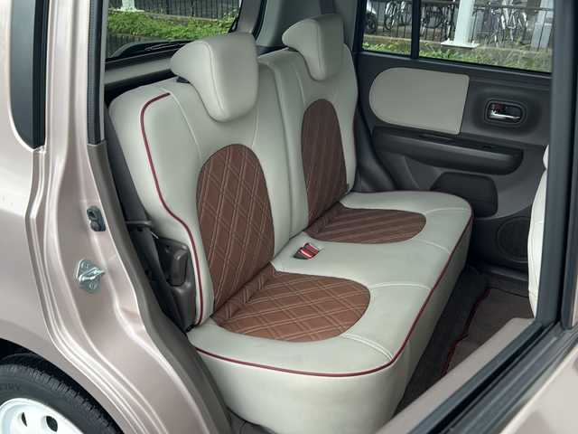 スズキ ラパン ショコラ G 茨城県 2014(平26)年 4.5万km シャンパンピンクPM 社外7インチナビ/Bluetooth/TV/iPod/バックカメラ/ETC/前後ドライブレコーダー/レザーシート/スマートキー/プッシュスタート/盗難防止装置/HIDオートライト/アイドリングストップ/純正アルミホイール/スペアキー