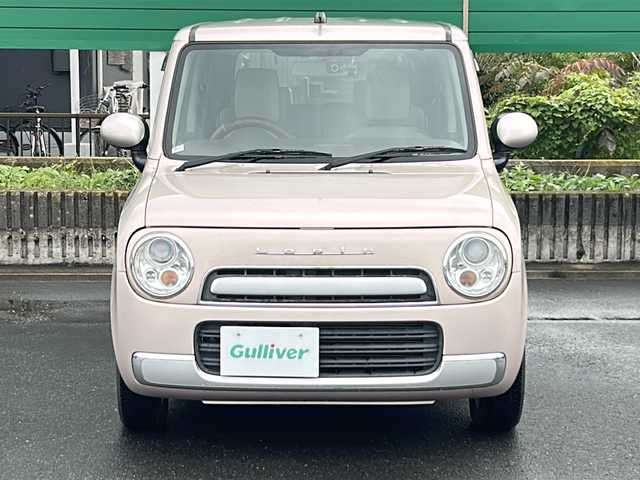 スズキ ラパン ショコラ G 茨城県 2014(平26)年 4.5万km シャンパンピンクPM 社外7インチナビ/Bluetooth/TV/iPod/バックカメラ/ETC/前後ドライブレコーダー/レザーシート/スマートキー/プッシュスタート/盗難防止装置/HIDオートライト/アイドリングストップ/純正アルミホイール/スペアキー
