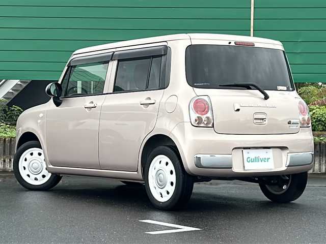 スズキ ラパン ショコラ G 茨城県 2014(平26)年 4.5万km シャンパンピンクPM 社外7インチナビ/Bluetooth/TV/iPod/バックカメラ/ETC/前後ドライブレコーダー/レザーシート/スマートキー/プッシュスタート/盗難防止装置/HIDオートライト/アイドリングストップ/純正アルミホイール/スペアキー