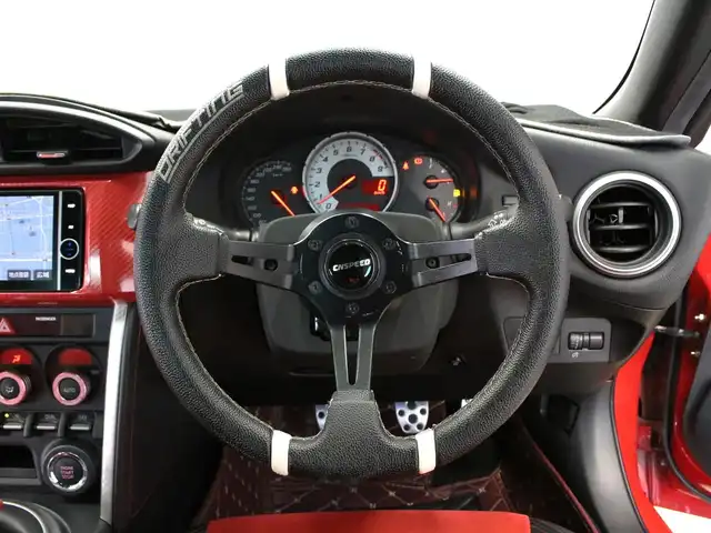 トヨタ ８６ GT 三重県 2013(平25)年 6.2万km ライトニングレッド MODELLISTAフロントスポイラー/MODELLISTAサイドスカート/MODELLISTAリヤスパッツ/純正リヤスポイラー/MODELLISTA WingDancer II18インチAW/HKSマフラー/BLITZアドバンスパワーエアクリーナー/BLITZ車高調整式ダンパー/社外LEDヘッドランプ・テールランプ/ILLINIUM FLUXシフトノブ/CNSPEEDステアリング/純正HDDナビ・地デジTV/・DVD/CD/・Bluetooth/バックカメラ/革/アルカンターラコンビシート/シートヒーター(前席)/ETC/プッシュエンジンスタート/スマートキー×2