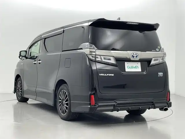 トヨタ ヴェルファイア ハイブリット ZR Gエディション 熊本県 2018(平30)年 7.7万km ブラック 純正１０インチナビ（ＣＤ・ＤＶＤ・フルセグ・ＢＴ・ＳＤ）/バックカメラ　/純正10インチフリップダウンモニター　/ビルトインＥＴＣ２．０　/両側パワースライドドア　/前後クリアランスソナー　/エアロ　（フロント、サイド、リア）/パワーバックドア/トヨタセーフティーセンス/・プリクラッシュセーフティ/・レーンディパーチャーアラート/・オートマチックハイビーム/・レーダークルーズコントロール/前席シートヒーター/シートベンチレーション/２列目シートヒーター/ステアリングヒーター/前席パワーシート/黒本革シート/純正フロアマット/LEONIS１７インチAW/オートライト/３眼LEDヘッドライト/スマートキー/プッシュスタート/スペアキー1本