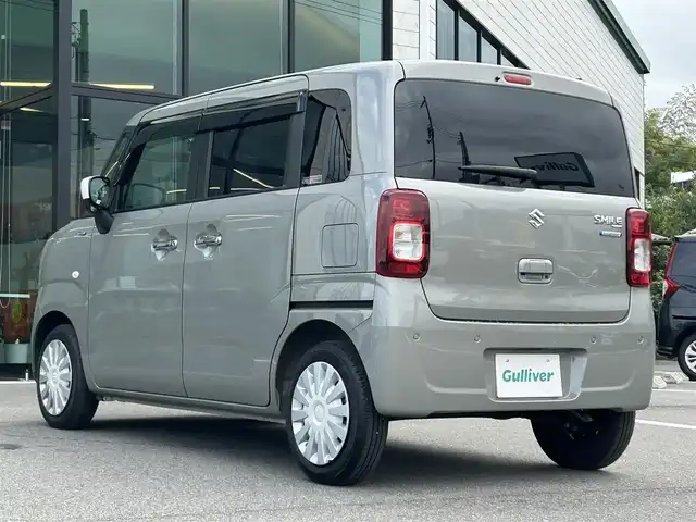 スズキ ワゴンＲ スマイル HYBRID S リミテッド 愛媛県 2024(令6)年 0.3万km モスグレーメタリック 純正8型ナビ(BT/フルセグTV)/バックカメラ/両側電動スライドドア/前後ドライブレコーダー/アイドリングストップ/バックソナー/衝突被害軽減装置/車線逸脱防止装置/LEDヘッドライト/運転席シートヒーター/ドアバイザー/純正フロアマット/電格ミラー/シガーソケット/ISOFIX/純正ホイールキャップ/現状サマー(鉄)(155/65/R14)/DUNLOP ENASAVE EC300＋/禁煙車